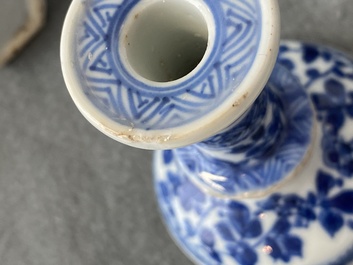 A pair of small Chinese blue and white candlesticks and three vases, Kangxi