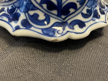 A Chinese blue and white five-piece garniture with floral design, Kangxi