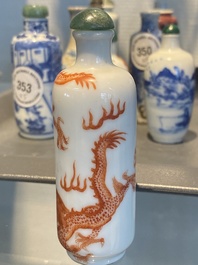 Five Chinese blue and white, iron- and copper-red snuff bottles, 19th C.
