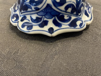 A Chinese blue and white five-piece garniture with floral design, Kangxi