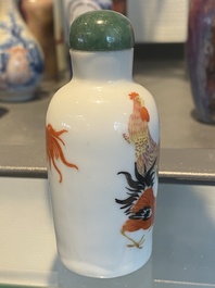 Five Chinese blue and white, iron- and copper-red snuff bottles, 19th C.