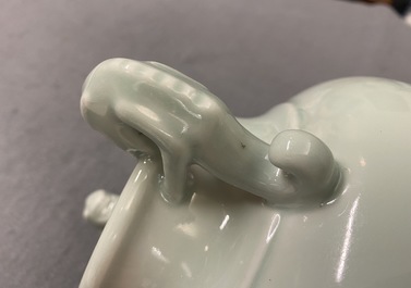 A Chinese monochrome dragon-handled celadon vase, Qianlong mark, 19/20th C.