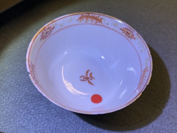 Seven Chinese famille rose 'Mandarin' cups and saucers, Qianlong