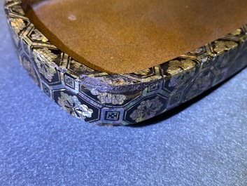 A Japanese aogai-nashiji 'kura' saddle with associated 'abumi' stirrups, Muromachi, 16th C.