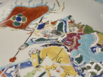 A Chinese famille rose dish with warriors on horseback, Qianlong