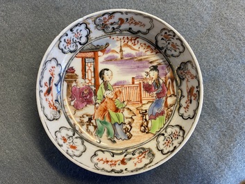 Seven Chinese famille rose 'Mandarin' cups and saucers, Qianlong