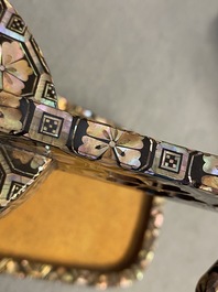 A Japanese aogai-nashiji 'kura' saddle with associated 'abumi' stirrups, Muromachi, 16th C.