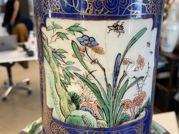 A massive Chinese famille verte on powder blue-ground rouleau vase, Kangxi