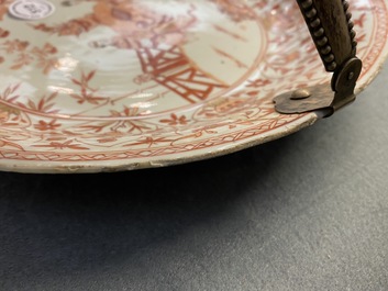 Three Chinese iron-red and gilt plates and a silver-mounted dish, Kangxi