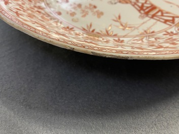 Three Chinese iron-red and gilt plates and a silver-mounted dish, Kangxi
