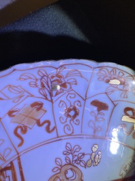 Three Chinese iron-red and gilt plates and a silver-mounted dish, Kangxi