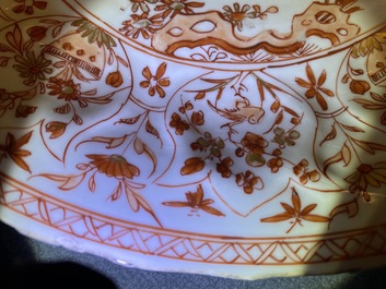 Three Chinese iron-red and gilt plates and a silver-mounted dish, Kangxi