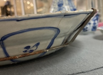 A Chinese blue and white kraak porcelain charger, a vase, a crow cup and a small plate, Wanli