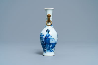 A Chinese blue and white vase with gilt elephant-head handles, Kangxi