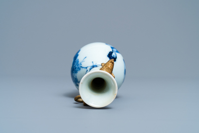 A Chinese blue and white vase with gilt elephant-head handles, Kangxi