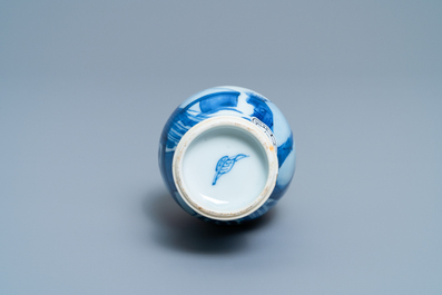 A Chinese blue and white vase with gilt elephant-head handles, Kangxi
