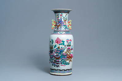 A Chinese famille rose vase with figures and antiquities, 19th C.