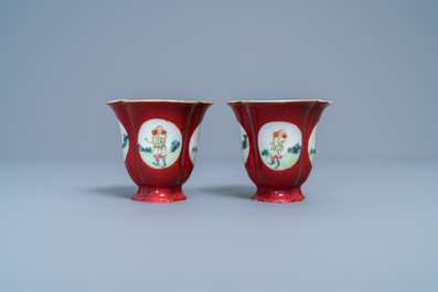 A pair of Chinese famille rose ruby-ground wine cups with foreigners, Qianlong