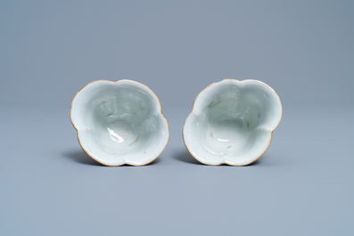 A pair of Chinese famille rose ruby-ground wine cups with foreigners, Qianlong