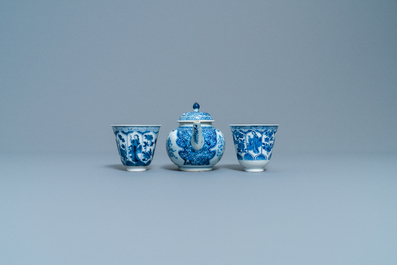 A Chinese blue and white teapot and a pair of wine cups, Kangxi