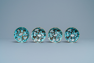 Four Chinese blue-ground Dayazhai-style 'dragon' cups and saucers, 19th C.