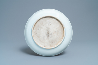A Chinese famille rose dish with a lady in a landscape, Yongzheng