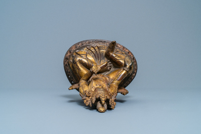 A Nepalese gilt bronze figure of White Tara, 16th C.