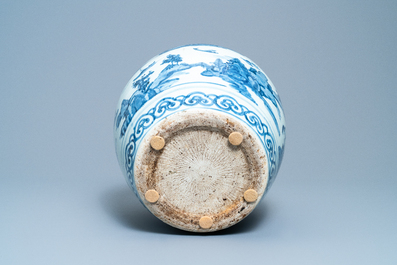 A Chinese blue and white vase with boats in a mountainous landscape, Ming