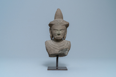 A grey sandstone bust of vishnu, Cambodia, Khmer, Angkor Wat period, 12th C.