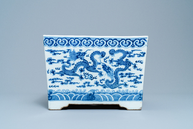 A square Chinese blue and white 'dragon' jardini&egrave;re, 19th C.
