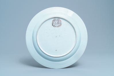 A large Chinese famille verte dish with ladies and boys in a garden, Kangxi