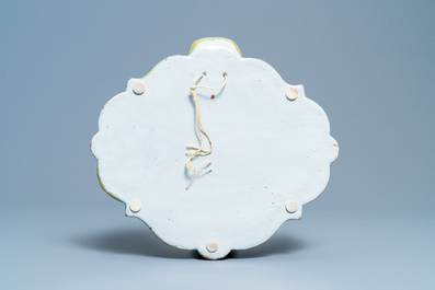 A polychrome Dutch Delft 'flower vase' plaque, 18th C.