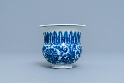 A Chinese blue and white 'lotus scroll' spittoon or zhadou, Kangxi