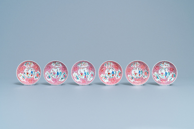 Six Chinese famille rose cups and saucers with a lady and a boy, Yongzheng/Qianlong