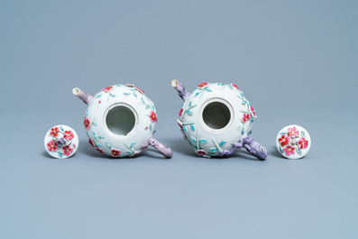 A pair of Chinese famille rose relief-decorated teapots with floral design, Yongzheng