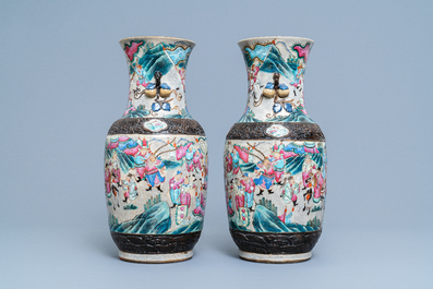 A pair of Chinese Nanking famille rose crackle-glazed 'warrior' vases, 19th C.