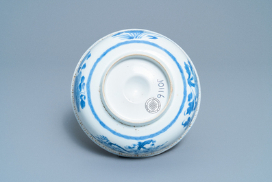 A Chinese blue and white relief-moulded bowl, Kangxi