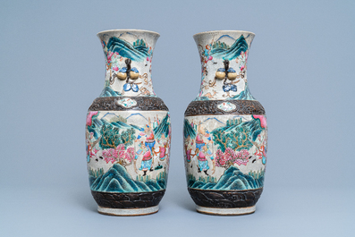 A pair of Chinese Nanking famille rose crackle-glazed 'warrior' vases, 19th C.