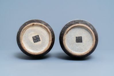 A pair of Chinese Nanking famille rose crackle-glazed 'warrior' vases, 19th C.