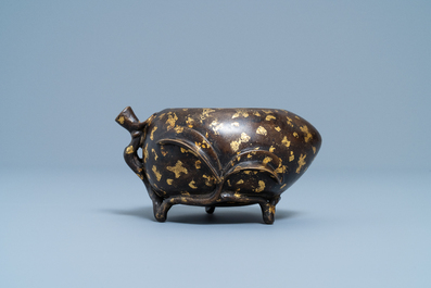 A Chinese gold-splashed bronze peach-form censer, Xuande mark, 18th C.