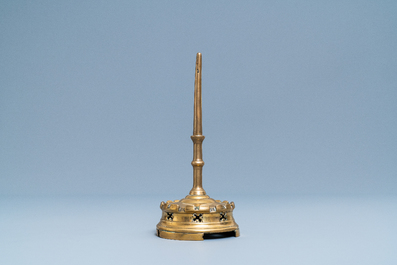 A Flemish or Dutch bronze candlestick, 14/15th C.