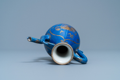 A Chinese gilt-decorated powder blue-ground jug with mythical beasts, Kangxi