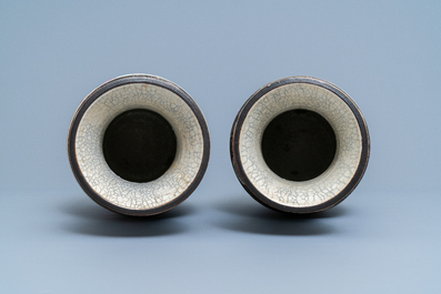 A pair of Chinese Nanking famille rose crackle-glazed 'warrior' vases, 19th C.