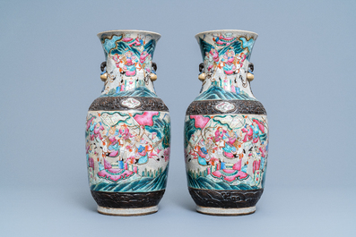 A pair of Chinese Nanking famille rose crackle-glazed 'warrior' vases, 19th C.