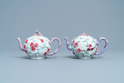 A pair of Chinese famille rose relief-decorated teapots with floral design, Yongzheng