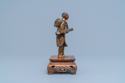 A Japanese bronze Miyao-style okimono, Meiji, 19th C.