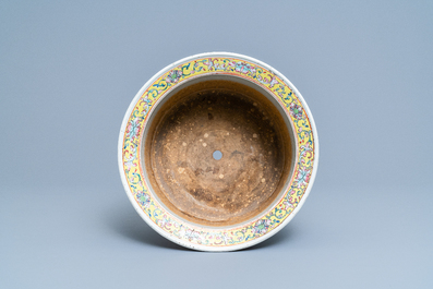 A Chinese turquoise-ground famille rose jardini&egrave;re, 19th C.
