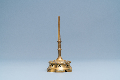 A Flemish or Dutch bronze candlestick, 14/15th C.