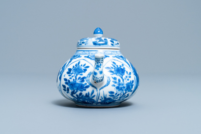 A Chinese blue and white soft paste teapot and cover, Kangxi