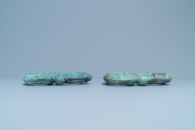 A pair of Chinese bronze ornaments, Han or later